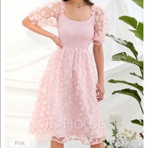 This is a new pretty pink dress made for any occasion!!